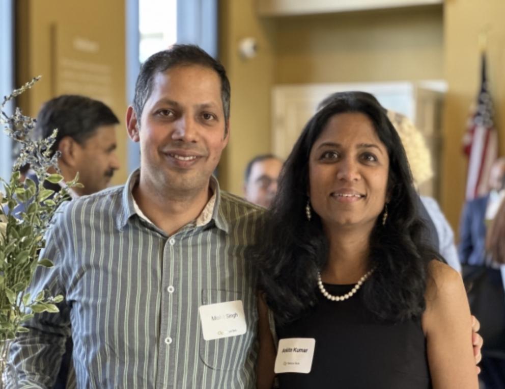 Two newly promoted faculty are pictured.