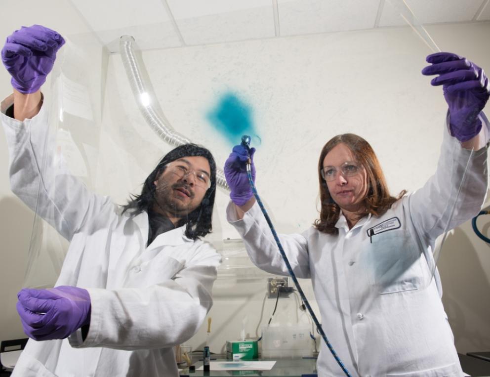 Eric Shen and Anna Osterholm are pictured in their lab.